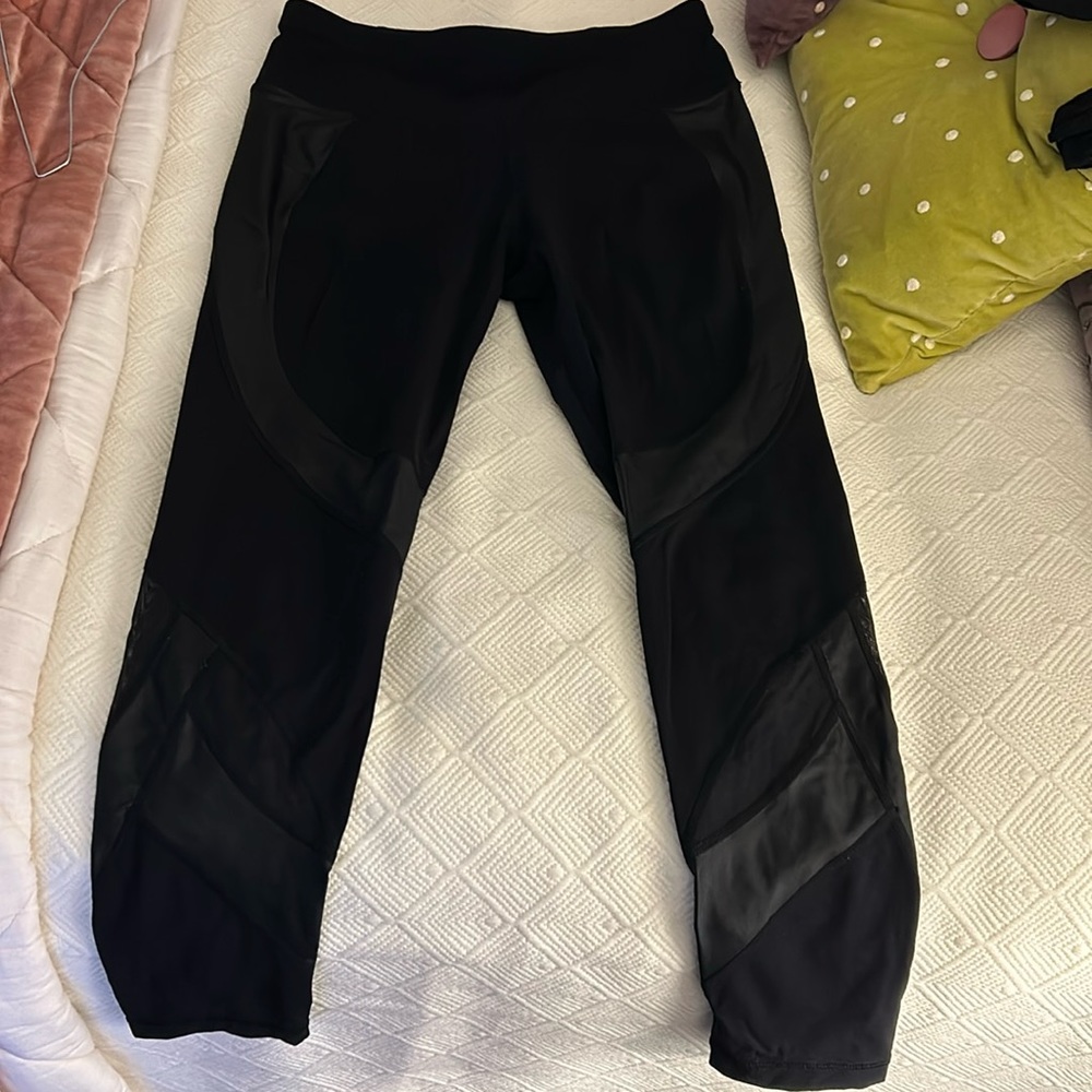 Sweaty Betty workout leggings with moto type elements down the leg